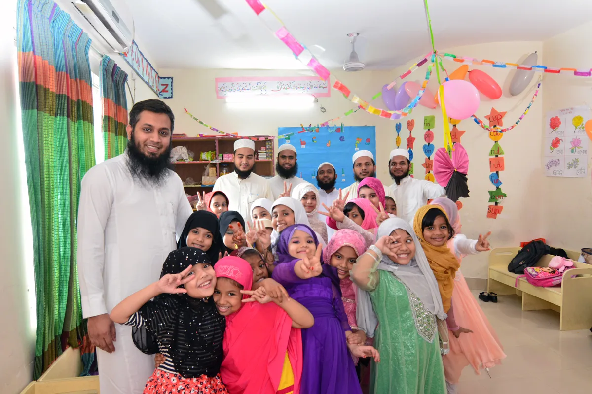 Children, parents and teachers gathered at a school celebration